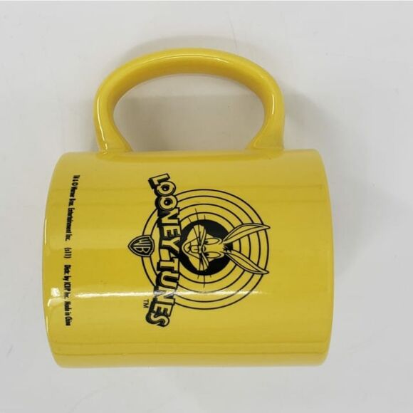 LOONEY TUNES yellow Daffy Duck mug - Picture 1 of 4